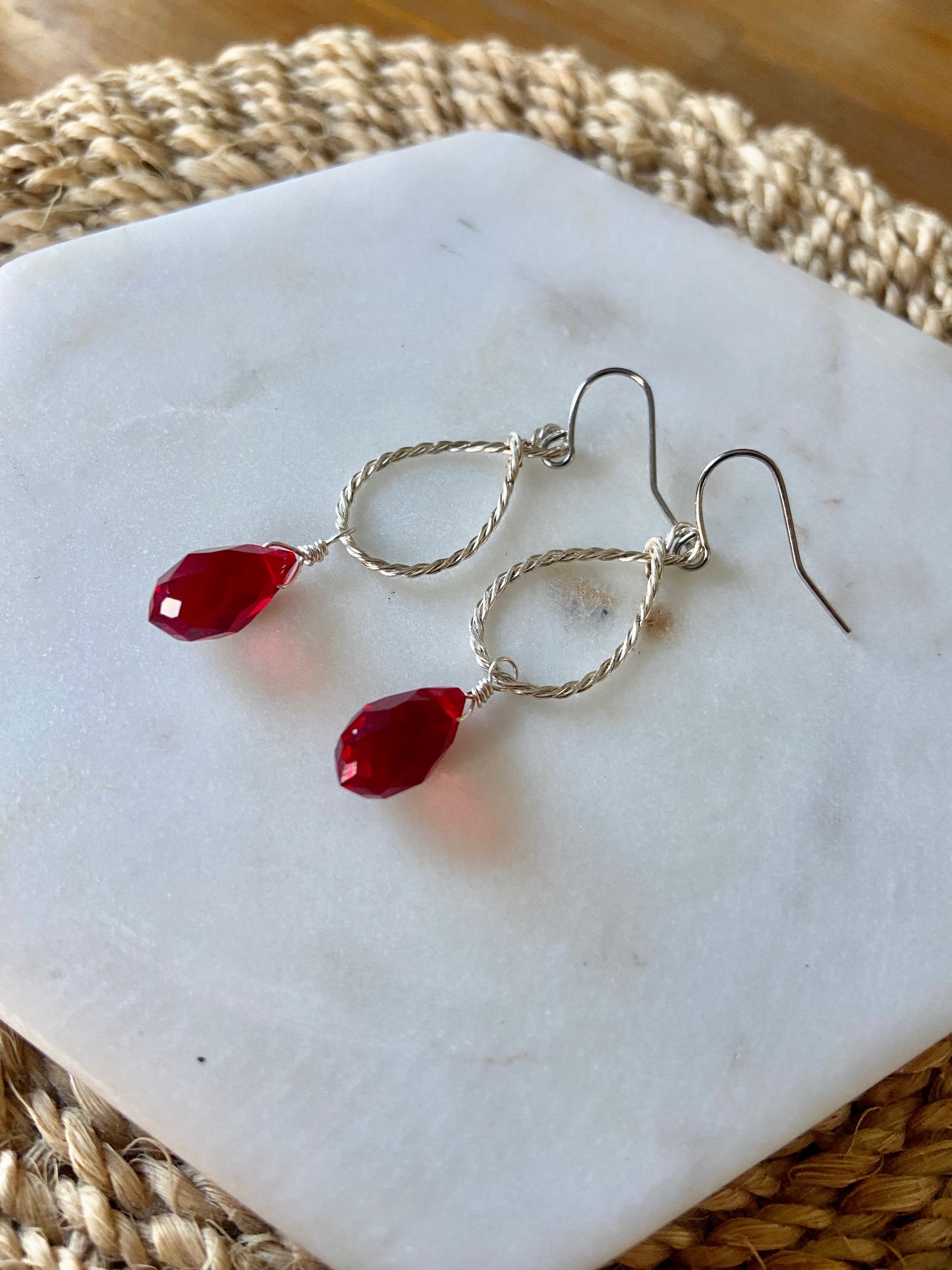 Earrings | Twisted Silver Hoops | Red Crystals